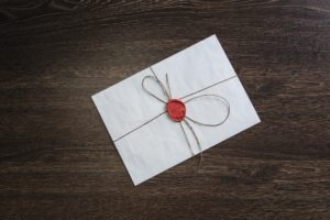 Letter with seal on table